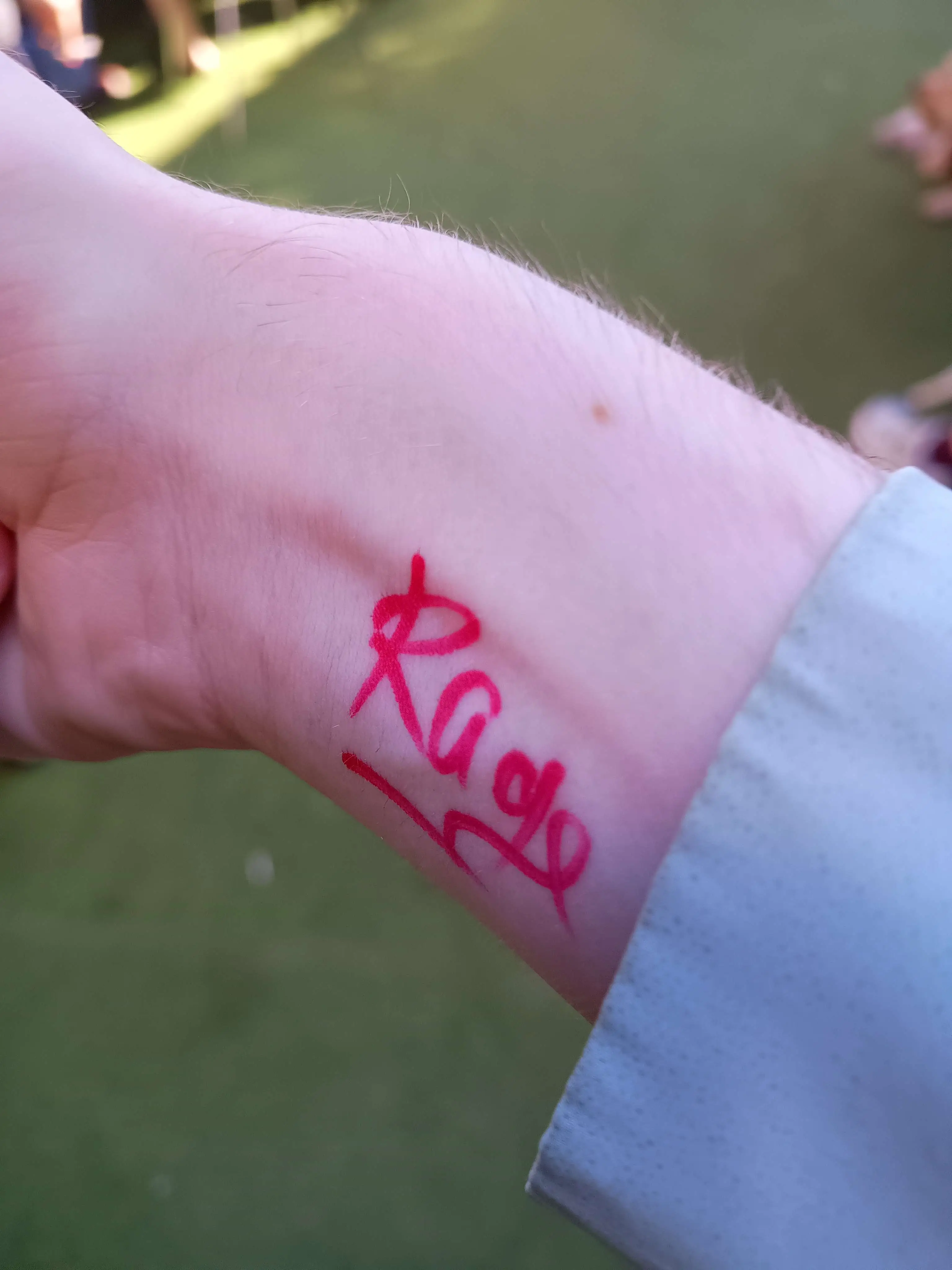 signature on the inside of Elwood's wrist