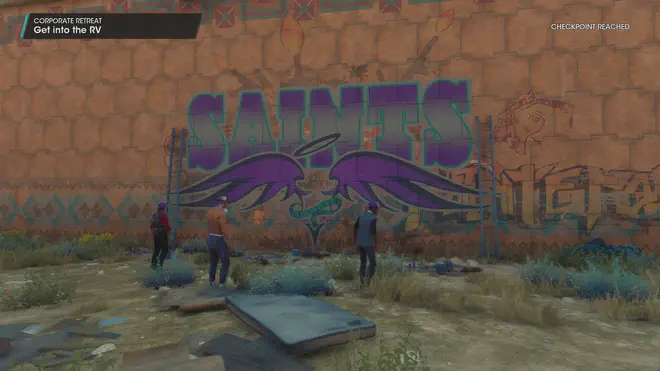 A Saints gang tag is graffiti’d on a wall