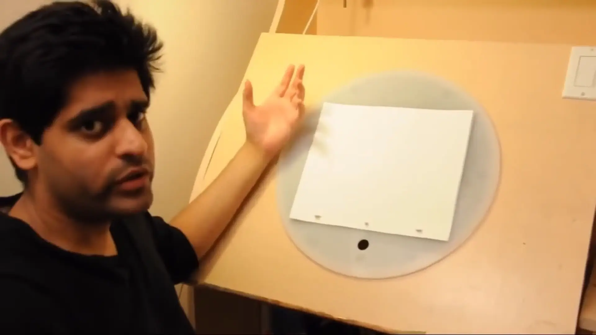 Sycra Yasin on an articulable Drawing Table.