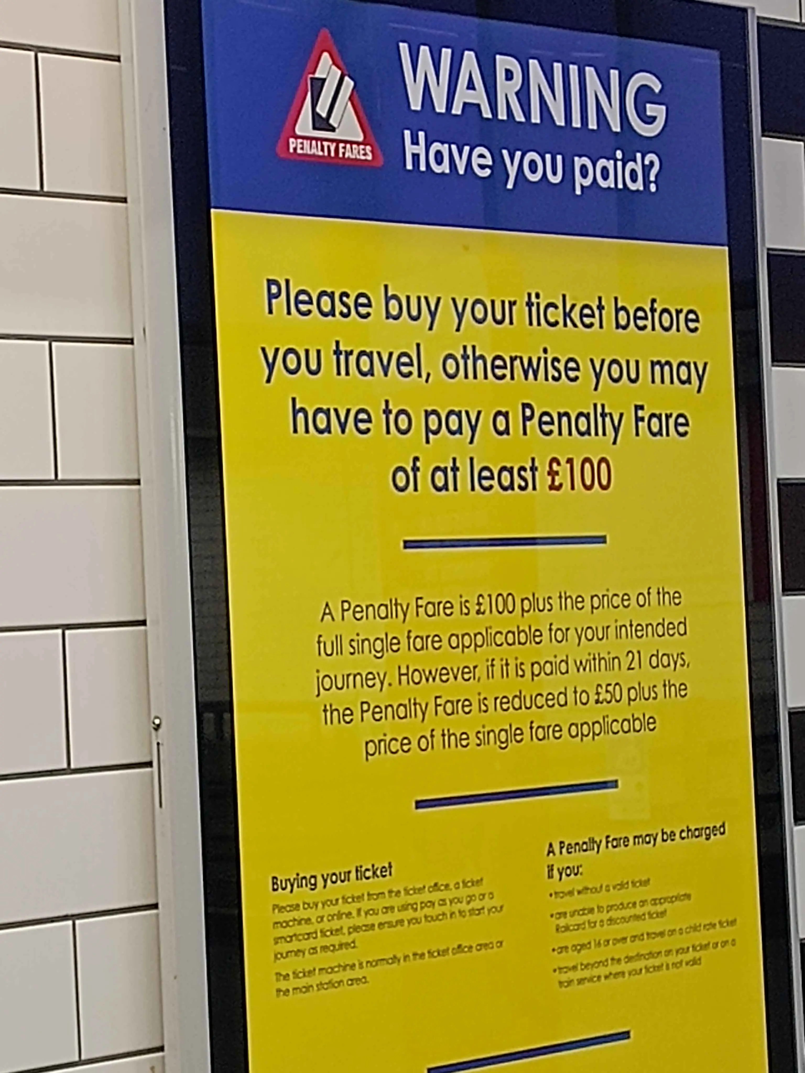 Notices informing commuters that they have to pay.
