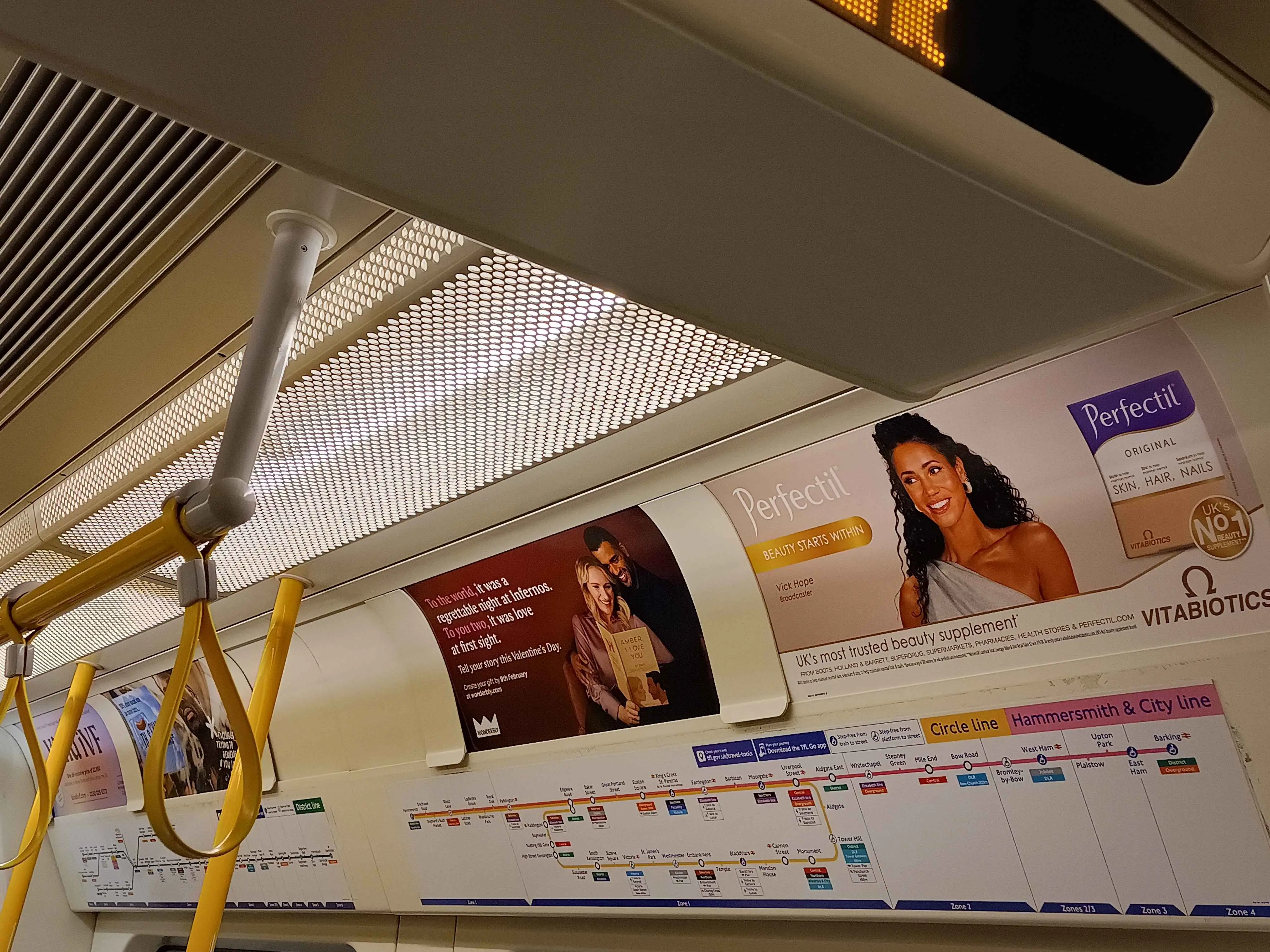 Train line maps accompanied with adverts.